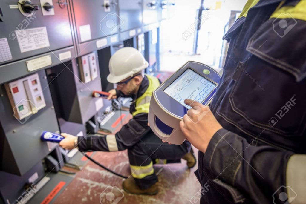 Workers using Partial Discharge partial discharge testing